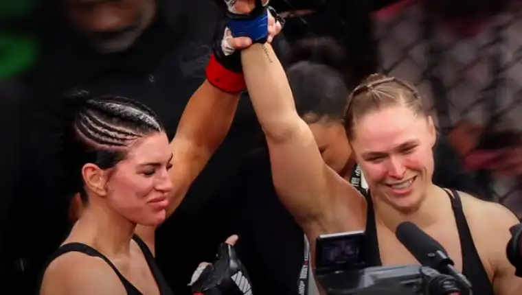 Rousey carano 1