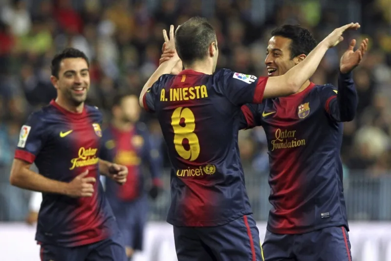 Thiago alcantara xavi hernandez andres iniesta