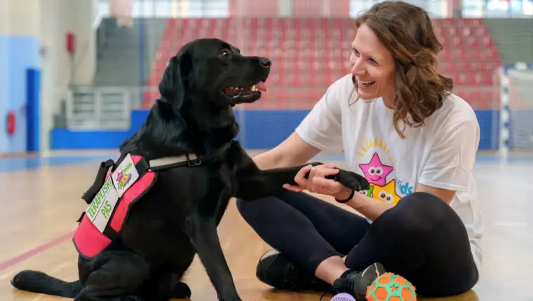 Maida therapy dog Tira scaled